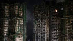 Zahl der Toten bei Großbrand in Hongkong steigt auf 94