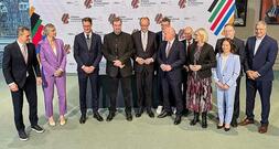 Merz unterzeichnet Vereinbarung für Olympiabewerbung