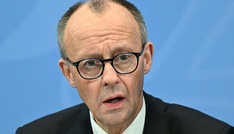 Merz zeigt sich nach