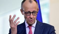 Merz verteidigt hohe Haushaltsausgaben für Aufrüstung