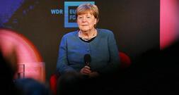 Linke: Merkel für EU-Verdienstorden geeigneter als Merz